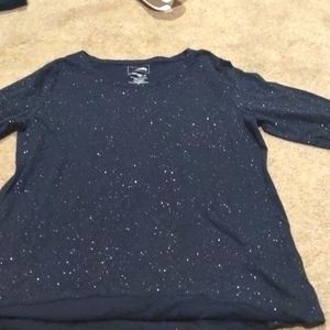 A blue and glitter shirt
